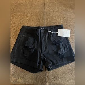 Women's Black ripped cuffed short shorts